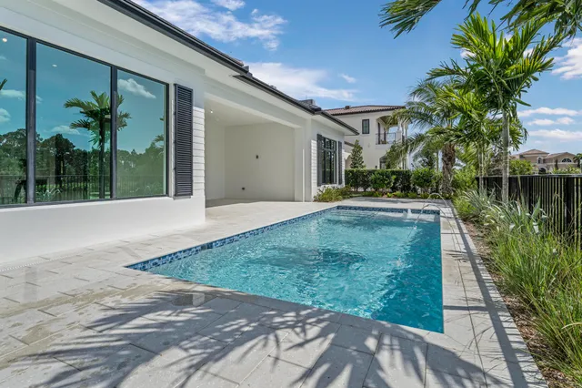 a view of a backyard of the house