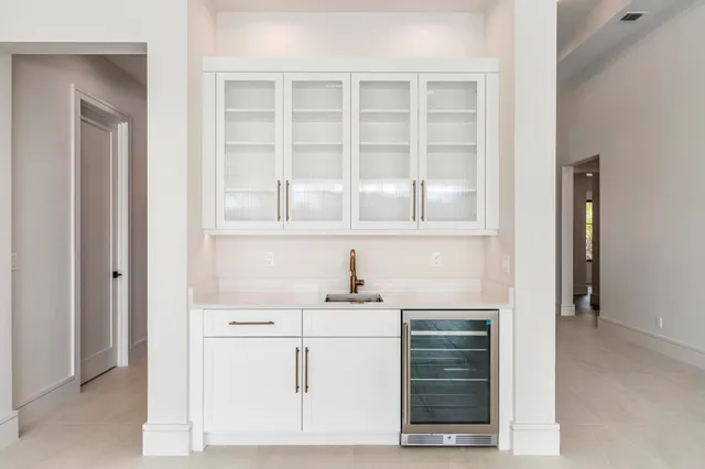 a bathroom with a sink vanity and a mirror
