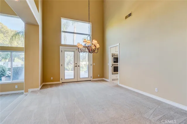 a kitchen with a stove a sink and a refrigerator
