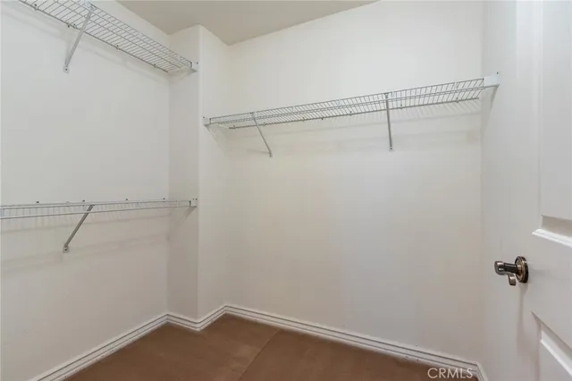 a view of a house with a swimming pool and a chairs