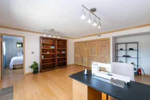 a workspace with furniture and window