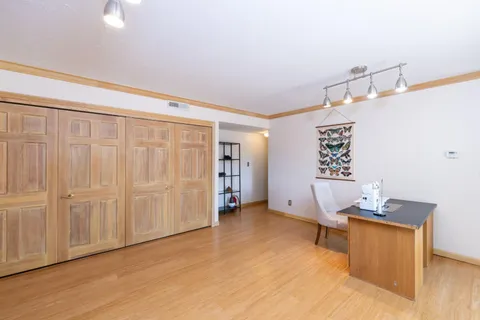 a view of a bedroom with closet area