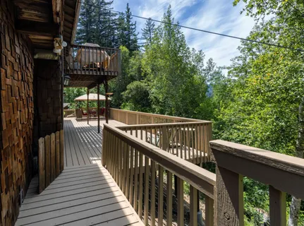 a view of a wooden house with a street