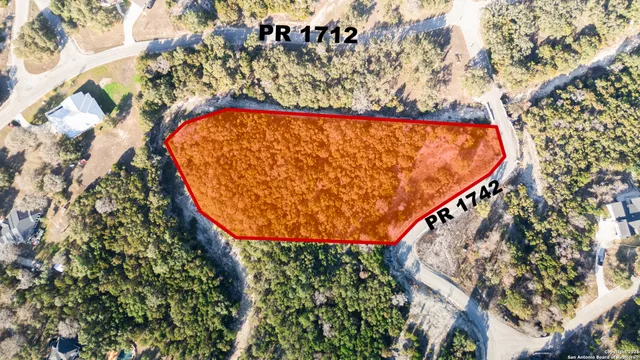 a view of swimming pool from a balcony