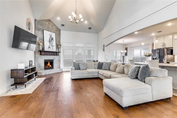 a living room with furniture and a table