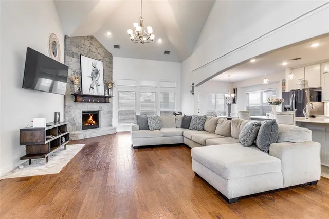 a living room with furniture and a table