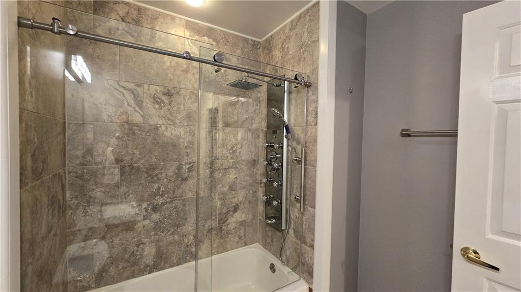 243 Augusta Street Pittsburgh, PA 15211 - Photo 34 of 43 a bathroom with a shower and a toilet