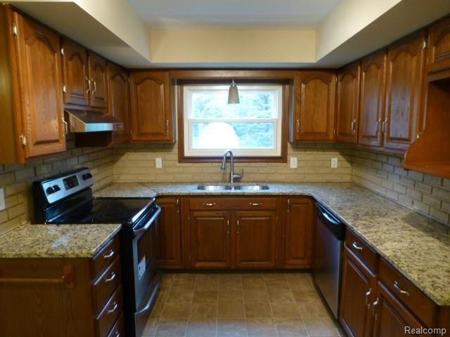 8165 Davison Road Davison, MI 48423 - Photo 6 of 21 Beautiful Granite Kitchen w/ New Stainless Steel Appliances