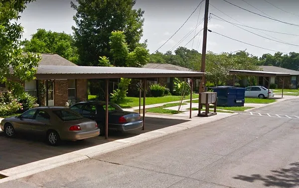 a view of a street with cars