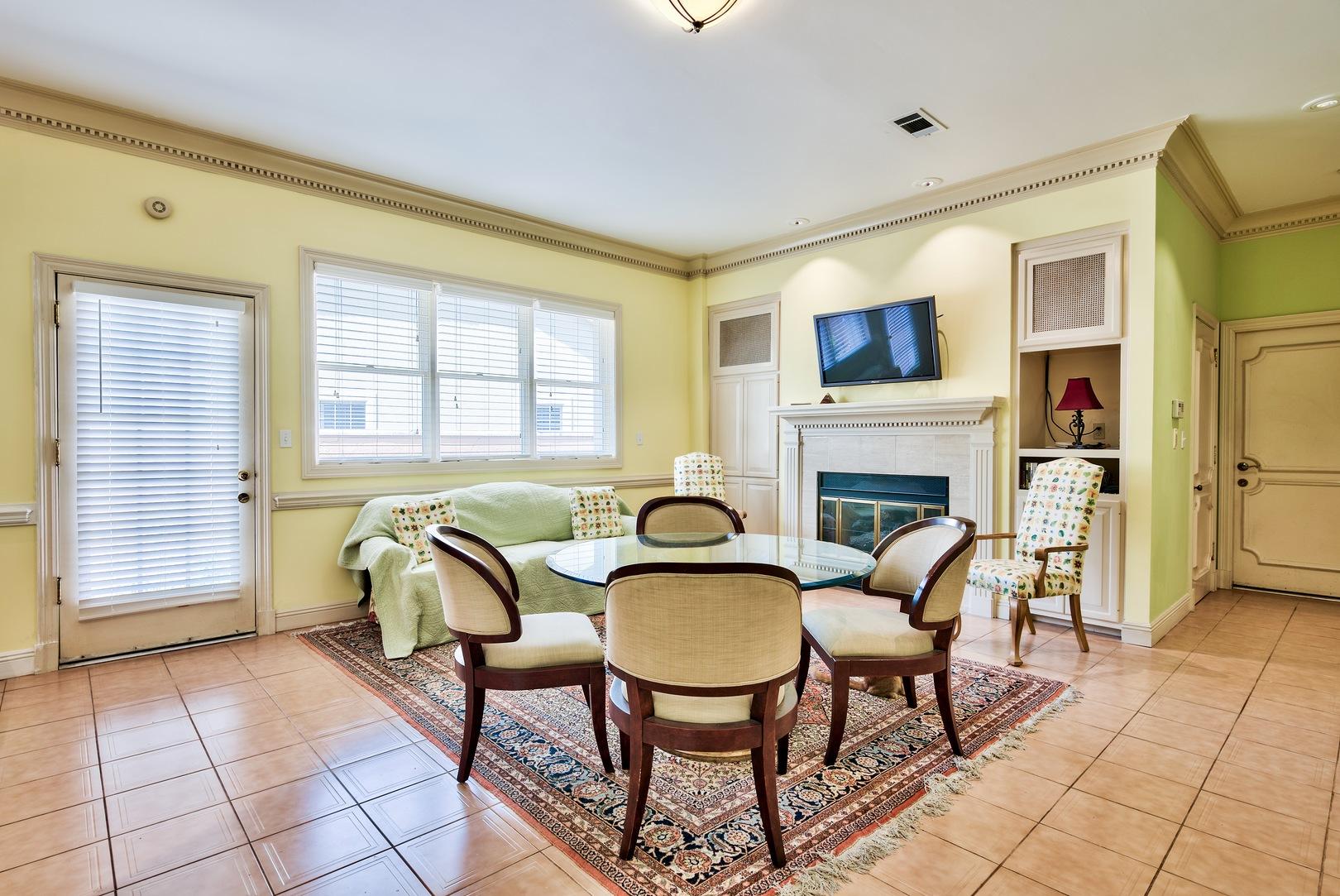 8 Weekewachee Circle Destin, FL 32541 - Photo 12 of 26 a dining room with furniture and a fireplace