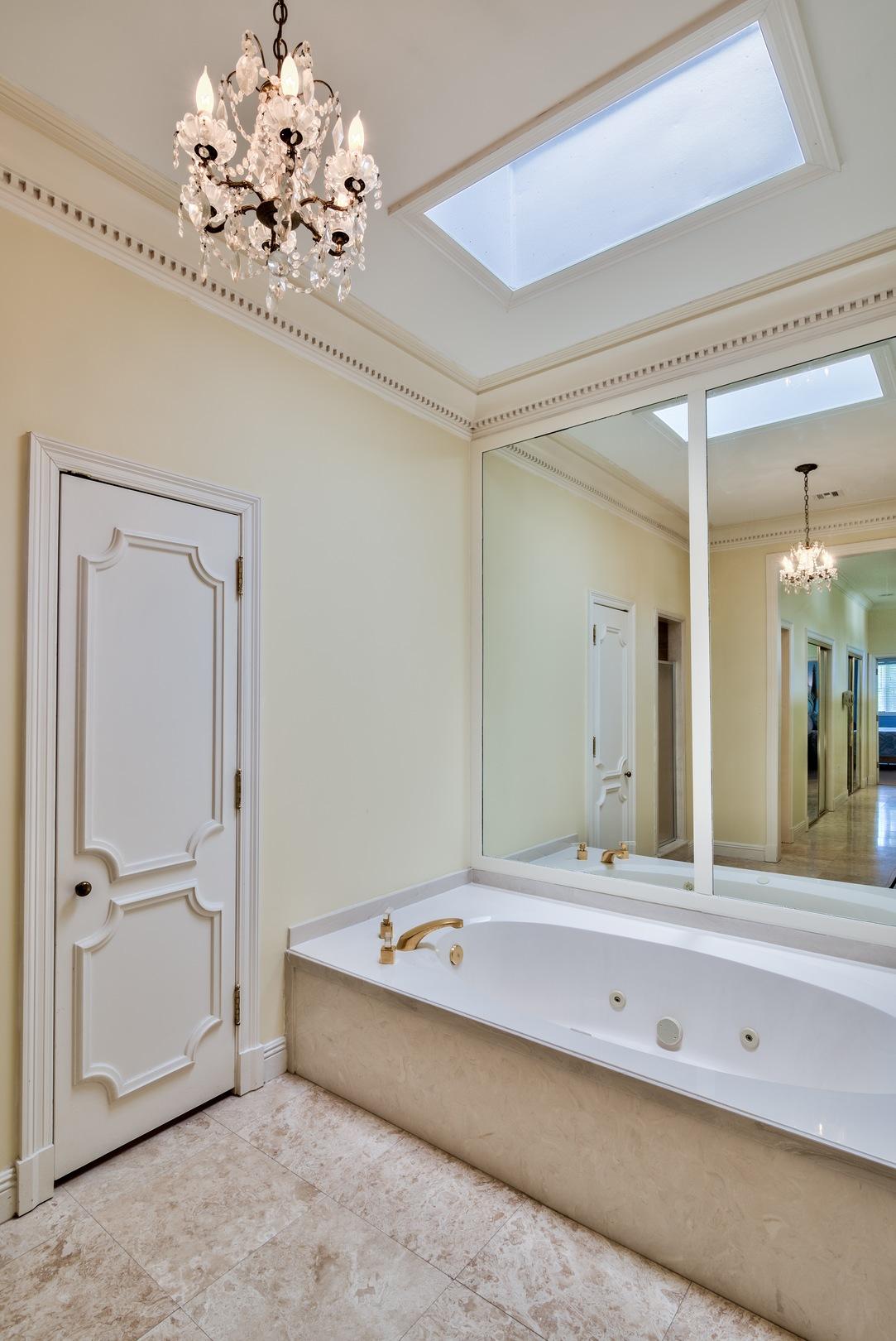 8 Weekewachee Circle Destin, FL 32541 - Photo 19 of 26 a bathroom with a double vanity sink and a mirror
