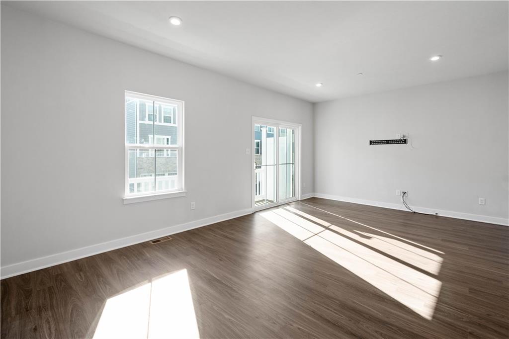 4108 Spruce Road Gibsonia, PA 15044 - Photo 16 of 45 a view of empty room with wooden floor and fan