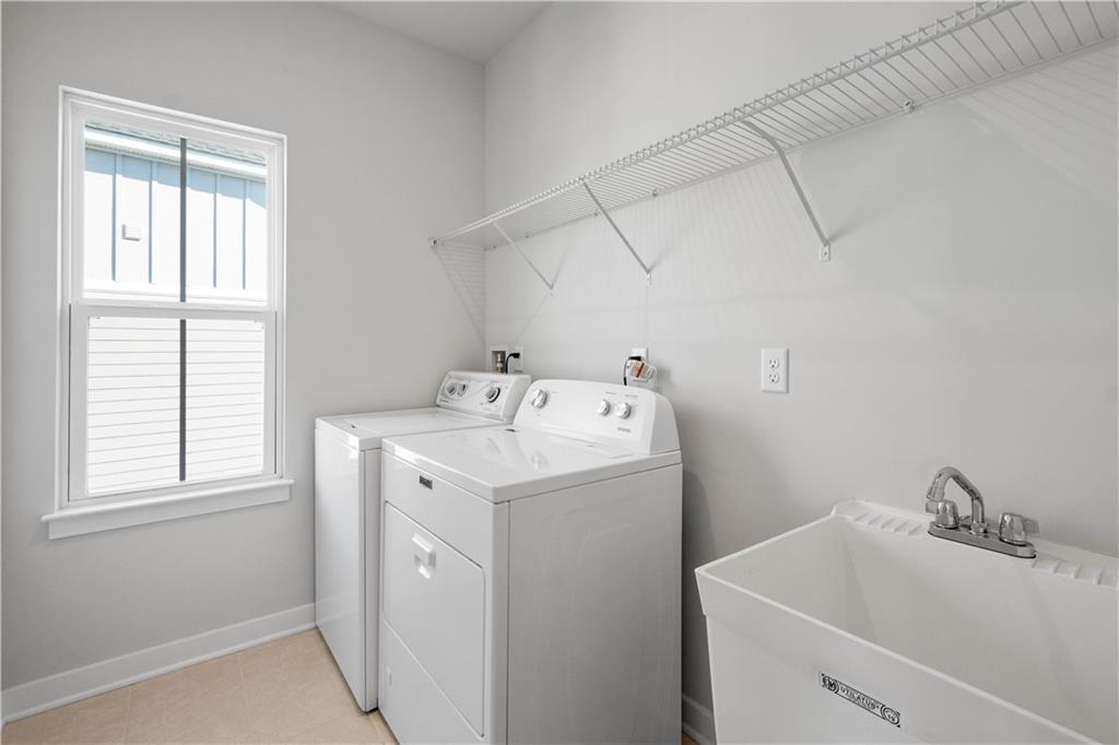 4108 Spruce Road Gibsonia, PA 15044 - Photo 29 of 45 a utility room with dryer and washer