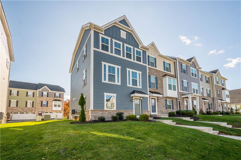 4108 Spruce Road Gibsonia, PA 15044 - Photo 31 of 46 a view of a big building with a big yard and large trees