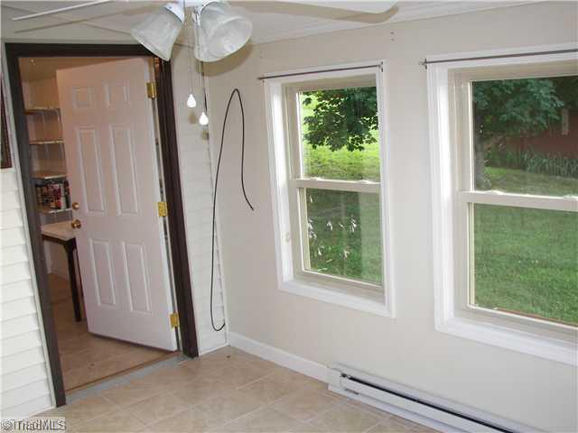 350 Welch Road Mount Airy, NC 27030 - Photo 6 of 12 Sunroom.