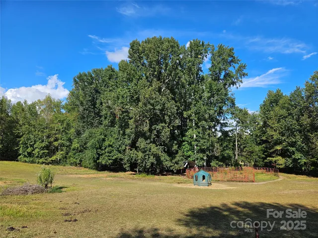 a view of a lake with a yard