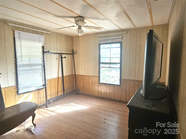 a view of livingroom with furniture wooden floor and window
