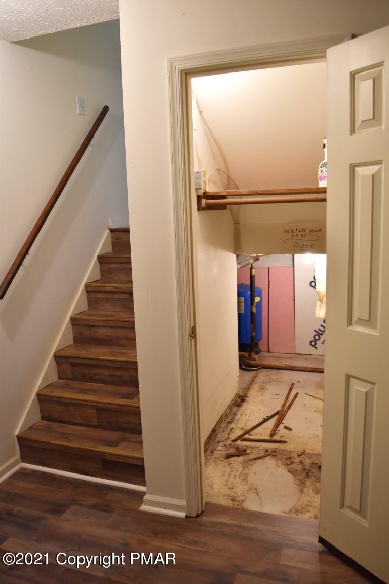 606 Rimrock Road Bartonsville, PA 18321 - Photo 30 of 68 Stairs from LL/Storage Closet