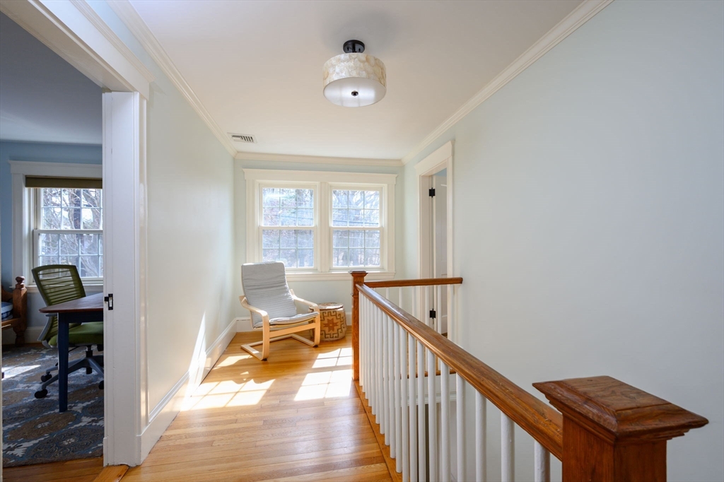 30 Ridge Road Milton, MA 02186 - Photo 17 of 33 a view of a workspace with wooden floor and a window