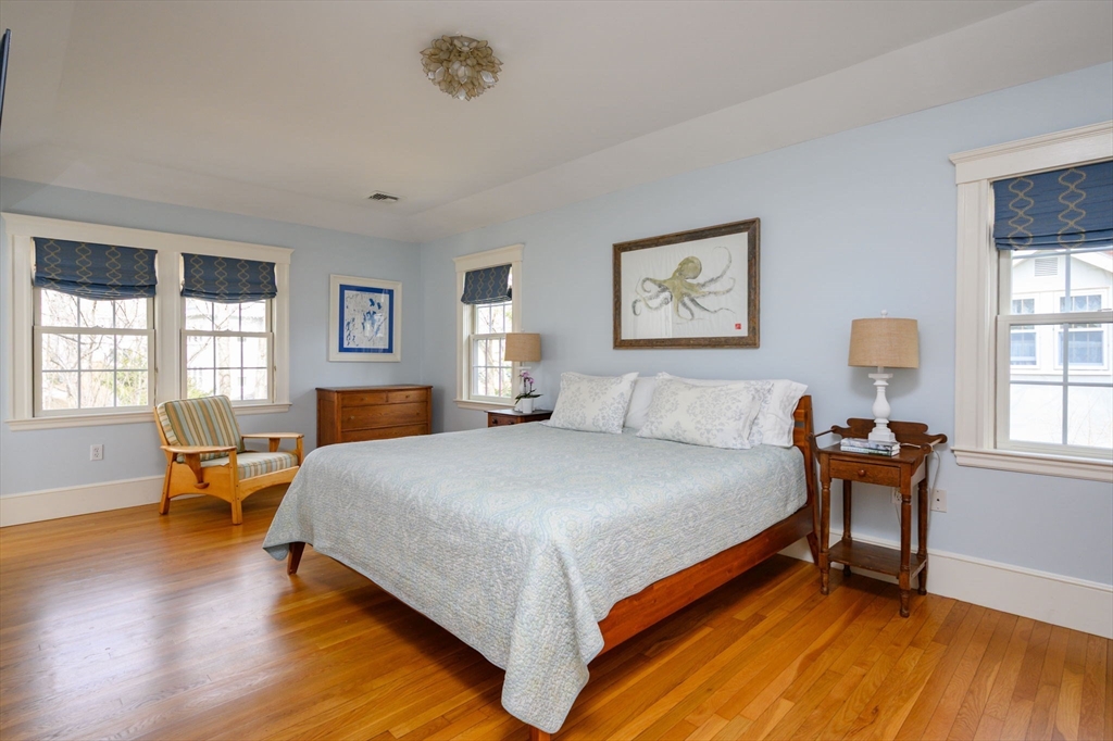30 Ridge Road Milton, MA 02186 - Photo 18 of 33 a bed room with a bed and a chair