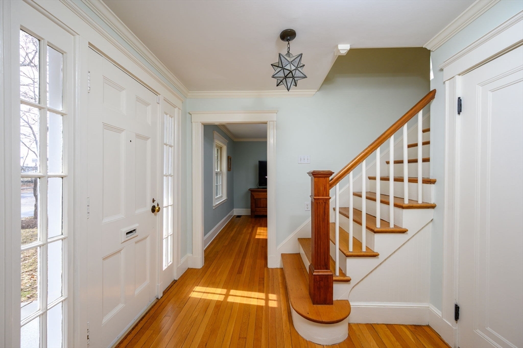 30 Ridge Road Milton, MA 02186 - Photo 2 of 33 a view of entryway and hall with wooden floor