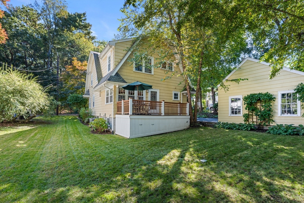 30 Ridge Road Milton, MA 02186 - Photo 27 of 33 a view of a house with a yard and sitting area