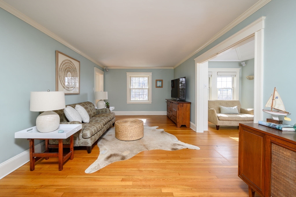 30 Ridge Road Milton, MA 02186 - Photo 3 of 33 a living room with furniture and a wooden floor