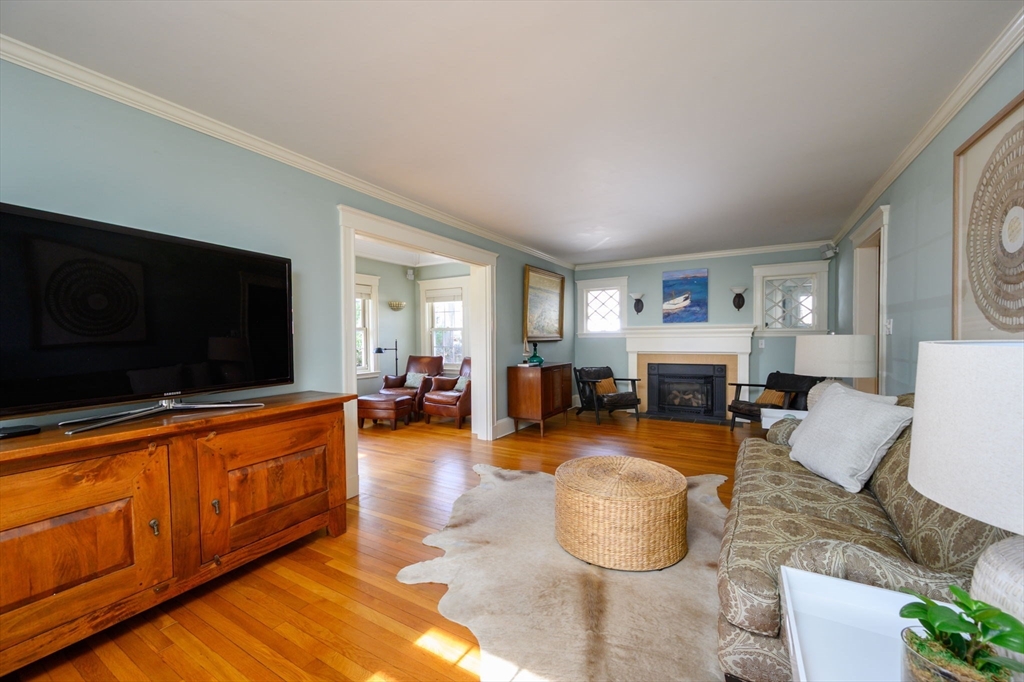30 Ridge Road Milton, MA 02186 - Photo 4 of 33 a living room with furniture and a flat screen tv