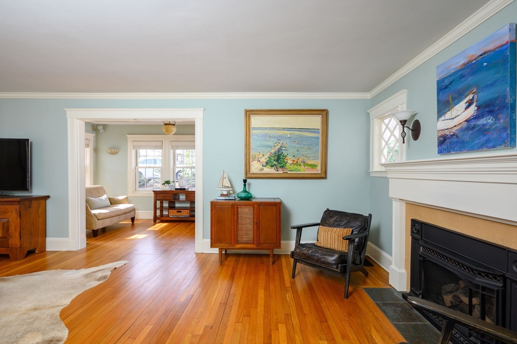 30 Ridge Road Milton, MA 02186 - Photo 5 of 33 a living room with furniture and a fireplace