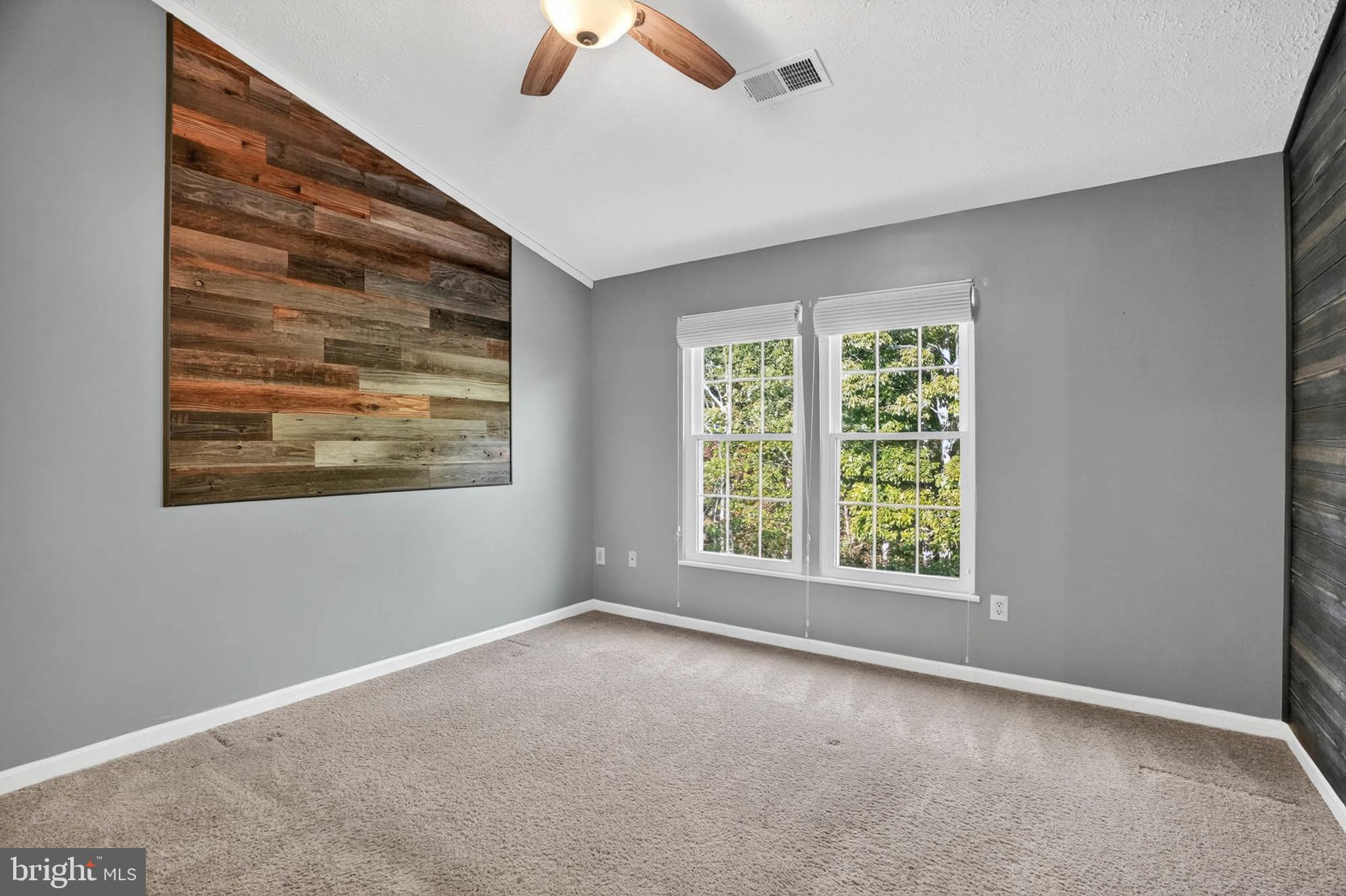 2512 Summers Ridge Drive Odenton, MD 21113 - Photo 19 of 37 an empty room with windows