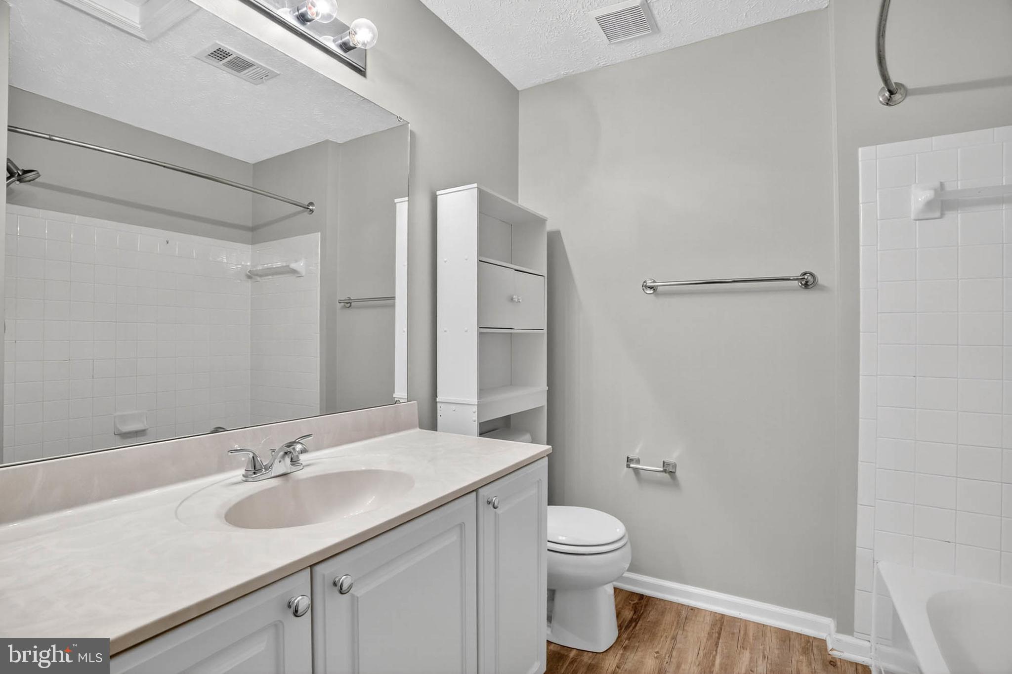 2512 Summers Ridge Drive Odenton, MD 21113 - Photo 26 of 37 a bathroom with a sink and a mirror