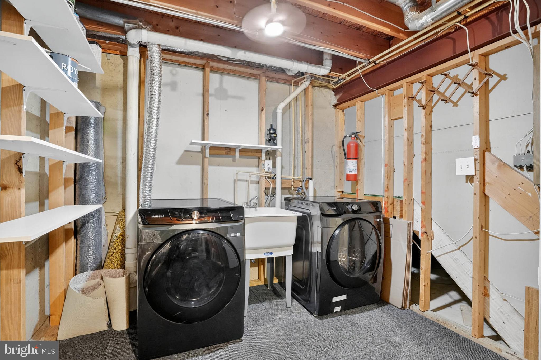 2512 Summers Ridge Drive Odenton, MD 21113 - Photo 32 of 37 a view of a storage & utility room with washer and dryer