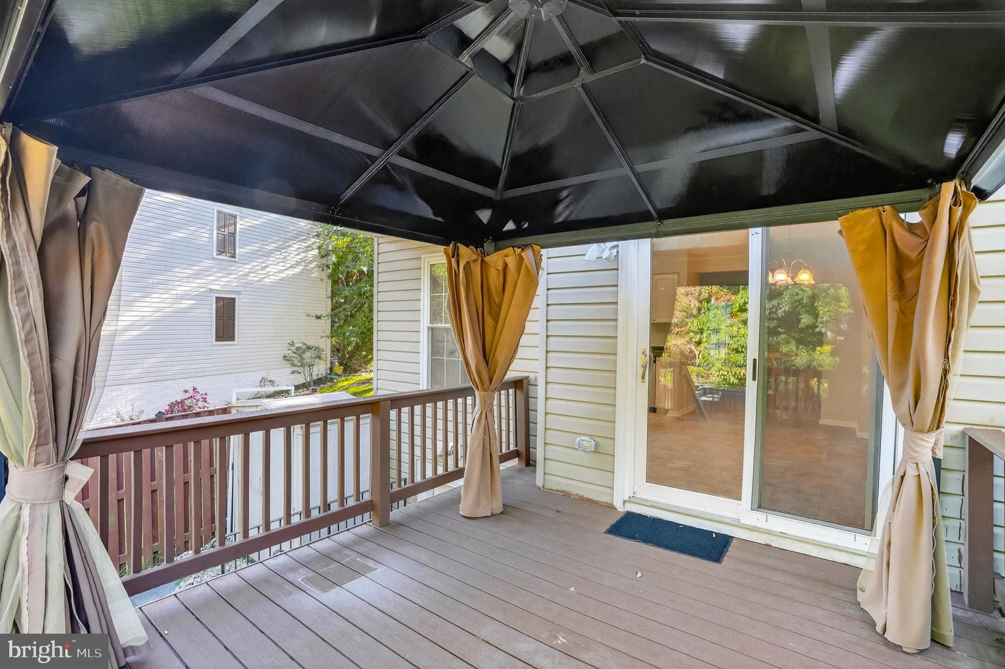 2512 Summers Ridge Drive Odenton, MD 21113 - Photo 34 of 37 a view of outdoor space with wooden floor and umbrella
