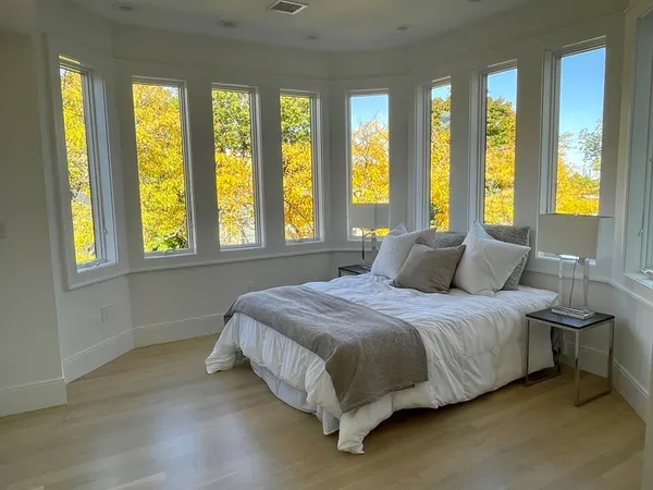 a bathroom with a sink and a window