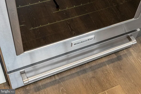 a bathroom with a shower and a mirror