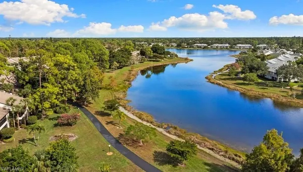 a view of a lake with a houses
