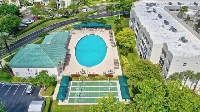 a view of swimming pool with a garden