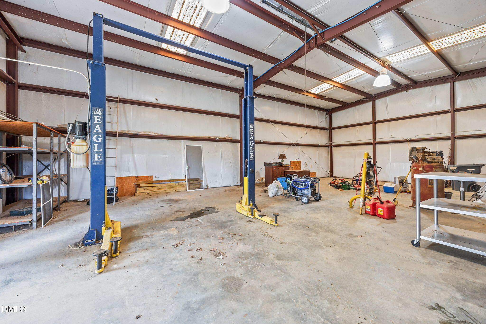 3611 Chewning Road Oxford, NC 27565 - Photo 8 of 45 a view of a garage with rack