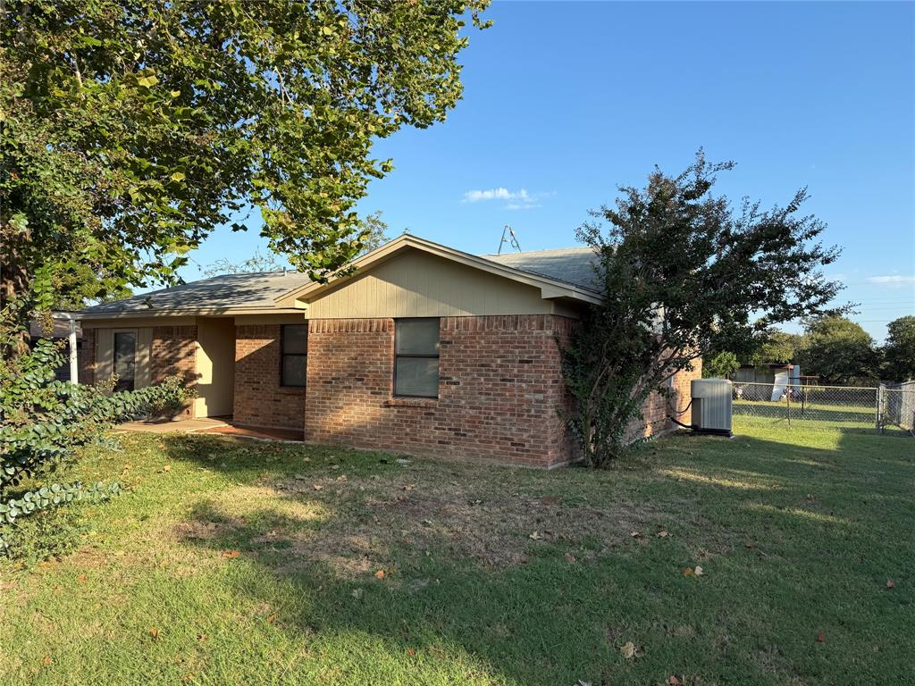 58 Roberts Road Mineral Wells, TX 76067 - Photo 2 of 28 a view of a house with a yard