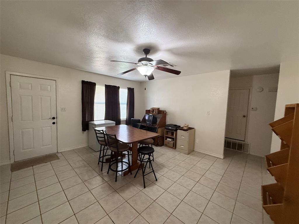 58 Roberts Road Mineral Wells, TX 76067 - Photo 6 of 28 a view of a dining room with furniture
