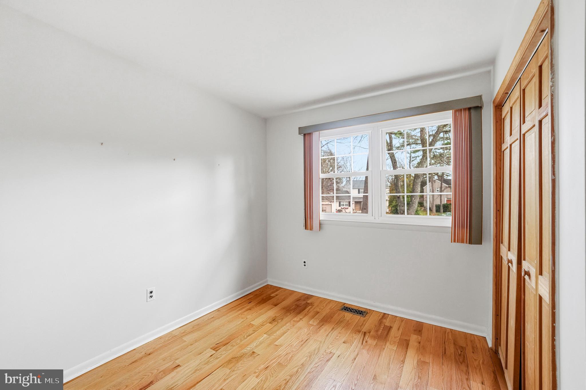 2 Winding Way Berlin, NJ 08009 - Photo 19 of 31 a view of empty room with wooden floor and fan
