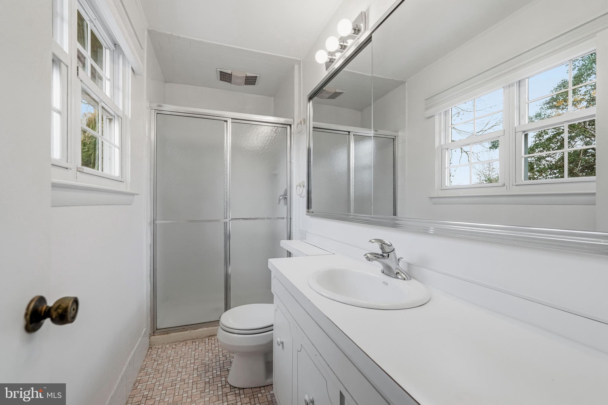 2 Winding Way Berlin, NJ 08009 - Photo 23 of 31 a bathroom with a sink toilet and shower