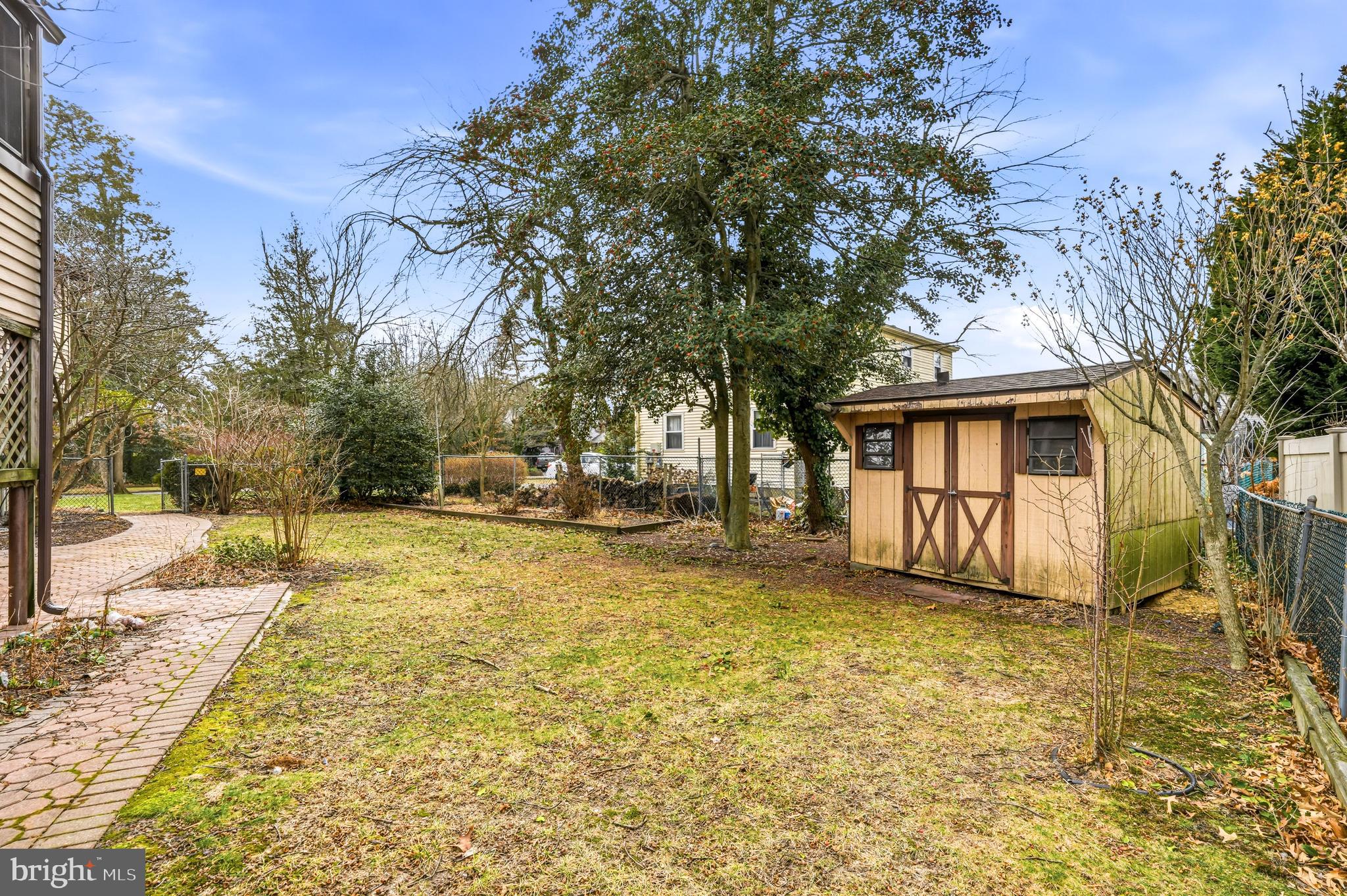 2 Winding Way Berlin, NJ 08009 - Photo 28 of 31 a view of a yard with a house and a tree