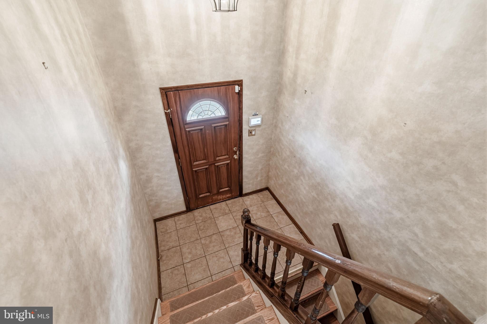 2 Winding Way Berlin, NJ 08009 - Photo 4 of 31 a view of a door with wooden floor