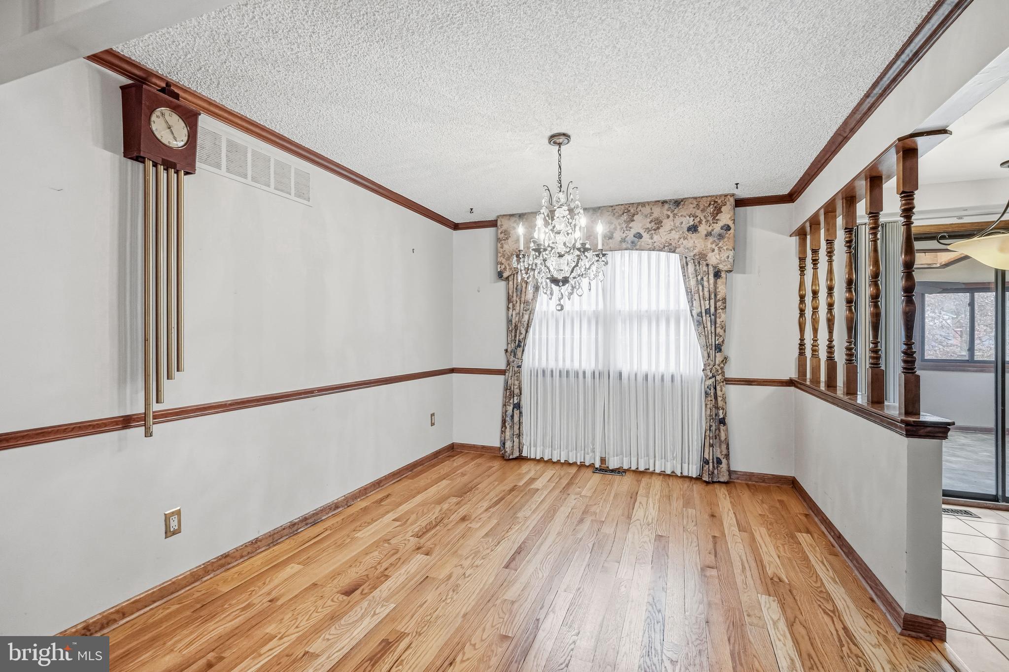 2 Winding Way Berlin, NJ 08009 - Photo 8 of 31 a view of empty room with wooden floor and fan