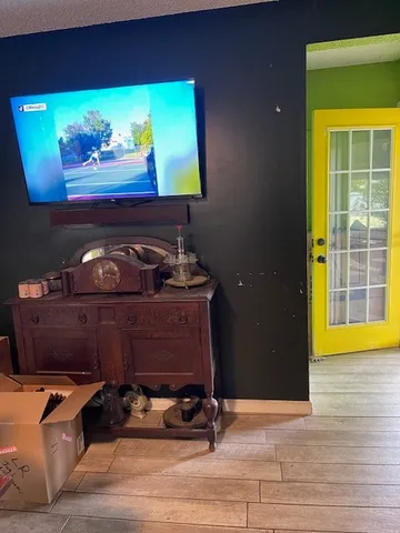 a room with furniture and a window