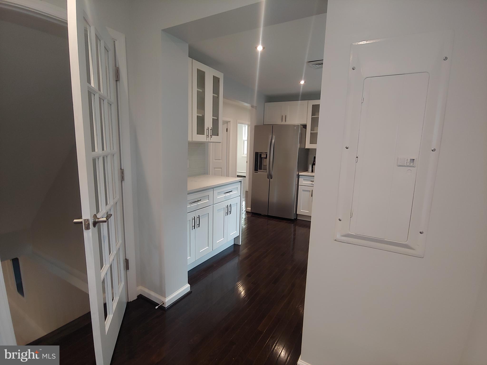 2630 East Maple Street Alexandria, VA 22306 - Photo 5 of 28 View to Kitchen + Basement Stairs