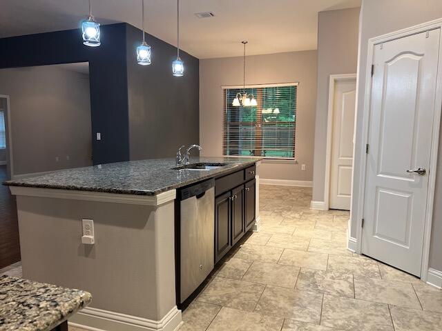 6123 Walk Along Way Crestview, FL 32536 - Photo 11 of 50 a kitchen with stainless steel appliances granite countertop a stove a sink and a refrigerator