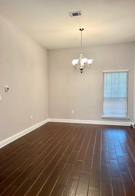 6123 Walk Along Way Crestview, FL 32536 - Photo 12 of 50 a view of a room with wooden floor and a ceiling fan
