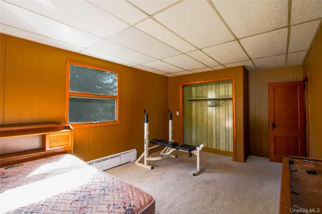 a view of a house with a yard and a garden